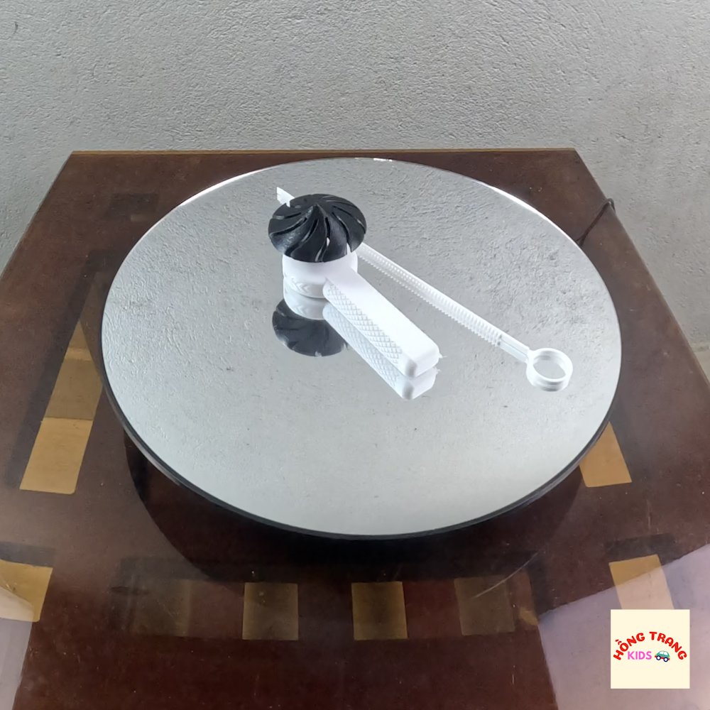 Con Quay Cho Bé - Ảnh 2